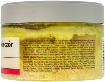 Peeling solny róża-mandarynka do ciała, tył opakowania w słoiku, widoczne żółte wnętrze i etykieta ze składnikami.