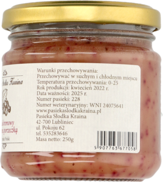 Słoik miodu kremowego z czarną porzeczką, widok z tyłu z etykietą i danymi producenta Pasieka Słodka Kraina.