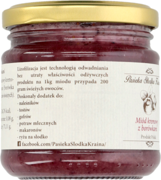 Tylna etykieta słoika kremowego miodu z borówką Pasieka Słodka Kraina, z opisem liofilizacji i zastosowań.
