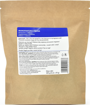 Brązowa papierowa torba Manufaktura Piękna, zestaw Męski Sześciopak kul do kąpieli, z niebieską etykietą i białym tekstem.