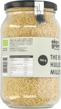 Tył szklanego słoika z ekologiczną kaszą jaglaną łuskaną 750g, widoczna etykieta z tabelą odżywczą.