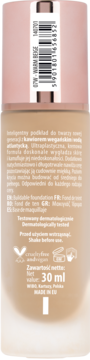 Tył opakowania beżowego podkładu do twarzy w odcieniu Warm Beige, 30ml, z różową nakrętką i kodem.