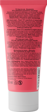 Tył różowej tubki kremu do rąk z brzoskwinią 50 ml i informacjami o produkcie w wielu językach.