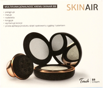 Skinair Touch BB Cream w otwartym czarnym kompakcie ze złotym brzegiem i aplikatorem na jasnym tle.