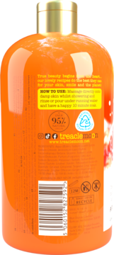 Pomarańczowa butelka żelu pod prysznic Spiced Gingerbread Biscuit, widok z tyłu z instrukcją użycia i kodem kreskowym.