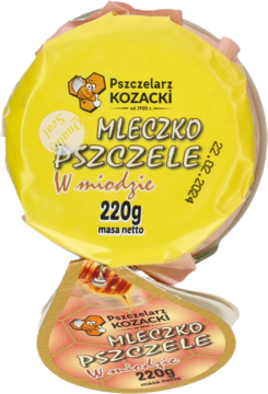 Dwa okrągłe opakowania Mleczka Pszczelego w miodzie Pszczelarz Kozacki 220g, żółte na złotym, widok z przodu.