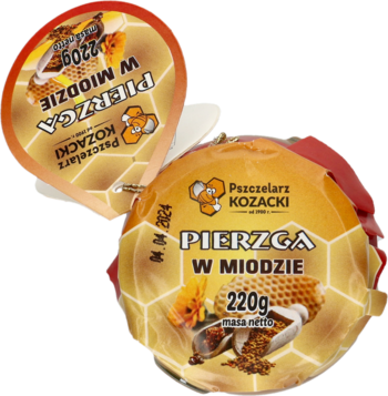 Dwa okrągłe opakowania Pszczelarz Kozacki Pierzga w miodzie 220g, złocisty miód, jeden otwarty z datą.