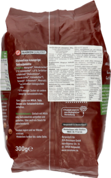 Tył brązowej paczki bezglutenowych kuleczek zbożowych 300g enerBiO z listą składników i danymi odżywczymi.