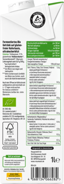 Tył opakowania bezglutenowego napoju owsianego enerBiO, z tabelą wartości odżywczych i listą składników.