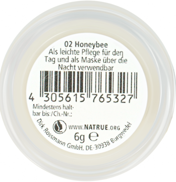 Maska do ust Alterra Honeybee 6g, widok z góry. Biała etykieta z kodem kreskowym i tekstem „Als leichte Pflege”.