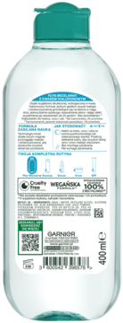 Tył przezroczystej butelki Garnier Płyn Micelarny 400ml z kwasem hialuronowym. Widoczne szczegóły, skład i certyfikaty wegańskie.