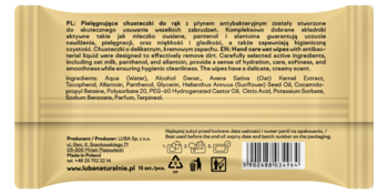Tył opakowania pielęgnujących chusteczek do rąk z płynem antybakteryjnym, złoty, z listą składników.