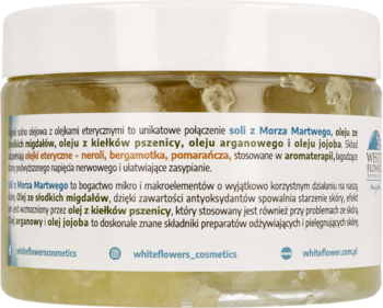 Tył słoika kąpieli solno-olejowej Whiteflowers z solą z Morza Martwego i olejami, widoczne szczegóły składu.