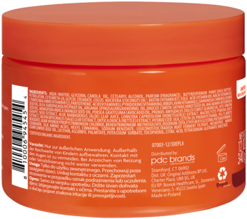 Tył pomarańczowego słoika kokosowego kremu do stylizacji włosów, z widoczną etykietą składu i instrukcjami.