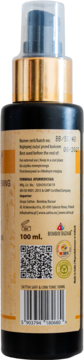 Tył ciemnej butelki ajurwedyjskiej wcierki do włosów SATTA TONIC 100ml ze złotą pompką i kodem QR.