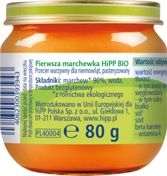 Zbliżenie na tył słoiczka HiPP BIO Pierwsza Marchewka, etykieta z opisem składu (90% marchwi) i wagi 80g.