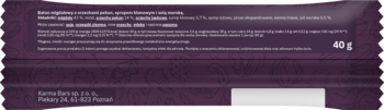 Tył fioletowego opakowania batona energetycznego z magnezem, 40g, z tekstem o wsparciu nerwów i mięśni.
