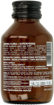 Tył brązowej butelki BIO VIGO Kombucha, widoczna biała etykieta ze składem i datą 10.12.2021.