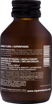 Tył brązowej butelki BIO VIGO Kombucha Shot, czarna nakrętka, etykieta z danymi o wit. C, bakteriach, wegański.