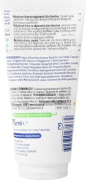 Tył białej tubki kremu Babydream Extra Sensitive 75 ml, z polskim opisem, składem i zielonymi detalami.