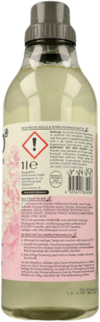 Tył butelki Eco Freude płynu do prania delikatnego 1l. Jasnozielony płyn, etykieta z ostrzeżeniem i kodem kreskowym.
