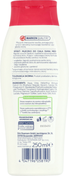 Tył białej butelki Isana Med Mleczko do ciała 250ml z różową zakrętką, widoczny skład z mocznikiem.