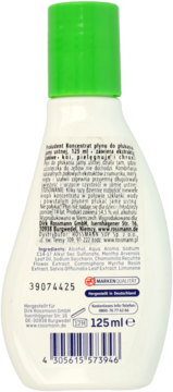 Tył białej butelki płynu Prokudent 125ml, z zieloną nakrętką i tekstem o ziołowych składnikach.