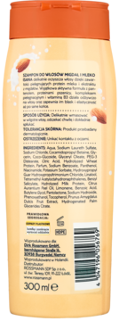 Tył beżowej butelki szamponu ISANA Migdał i Mleko 300ml, z pomarańczową nakrętką i etykietą składników.