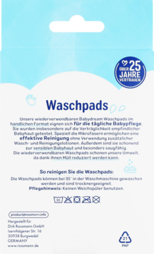 Tył opakowania Babydream Waschpads, biało-niebieskie, z niemieckimi instrukcjami prania i pieczątką 25 lat zaufania.