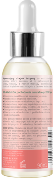 Tył opakowania regenerującego olejku intymnego 90ml w szklanej butelce z srebrnym zakraplaczem i różową etykietą.