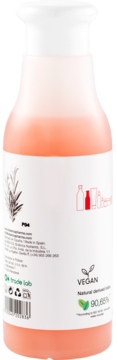Tył pomarańczowej butelki szamponu Botanicapharma Strength & Volume z logo VEGAN, info o 90% naturalnych składnikach i gałązką rozmarynu.