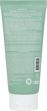 Rated Green Scalp Pack z olejem tamanu. Tył zielonej tubki z białym korkiem i szczegółowym opisem składu.
