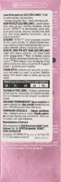 Tył opakowania kremu Isana Gold Brilliance do oczu, z polskim opisem, tabelą wieku i różowym tłem.