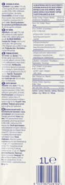 Tył opakowania napoju owsianego bezglutenowego 1L, białe z niebieskimi napisami. Widoczna tabela wartości odżywczych i skład.