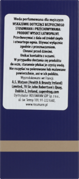 Tył opakowania wody perfumowanej dla mężczyzn, z białą etykietą i polskim tekstem dot. bezpieczeństwa i Rossmann.