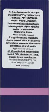 Tył ciemnoniebieskiego opakowania perfum męskich Artiscent Amber Envie. Biała etykieta z instrukcjami i danymi, różowy pasek.