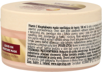 Tył beżowego słoika maski nawilżającej z witaminą E dla skóry suchej, z widoczną złotą etykietą i polskim opisem.