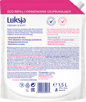 Tył białego opakowania uzupełniającego mydła Luksja Creamy & Soft 1.5L, z opisem i biodegradowalną formułą.