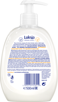 Tył białej butelki mydła w płynie Luksja Creamy & Soft 500ml, widoczny skład i kod kreskowy.