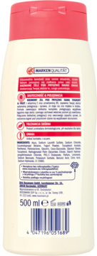 Tył butelki kremowego żelu pod prysznic Isana Yoghurt & Fruit 500ml z różową nakrętką i polskim opisem składników.