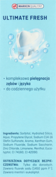 Przednia strona opakowania pasty do zębów ULTIMATE FRESH, z grafiką białego zęba i bąbelków na błękitnym tle.
