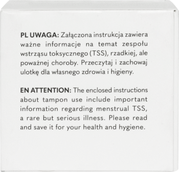 Biała etykieta informacyjna tamponów bawełnianych z ostrzeżeniem o TSS, tekst w języku polskim i angielskim.