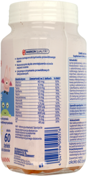 Tył białej butelki suplementu diety – żelek dla dzieci. Widoczna tabela składników odżywczych i kod kreskowy.