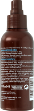 Tył brązowego sprayu Ziaja Masło Kakaowe 100ml, z etykietą i polskim opisem właściwości.