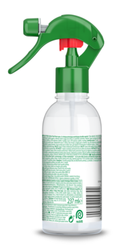 Tył butelki Air Wick Air Spray Maliny Limonka, przezroczysta, z kodem kreskowym i zielonym atomizerem.