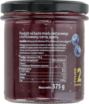 Tył słoika z miodem i liofilizowaną czarną jagodą. Widoczne dane odżywcze, masa 375g i 2 składniki.