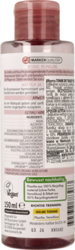 Różowa butelka toniku Rossmann 150ml, widok z tyłu, z logo wegańskim i tekstem o recyklingu materiału.