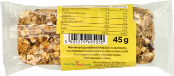 Ręcznie wykonany baton słonecznikowo-owsiany, 45g, bez cukru, z żółtą etykietą od góry.