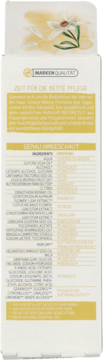 Tył opakowania kremu Alterra Premium Age z listą składników, na górze ilustracja białego kwiatu wanilii.