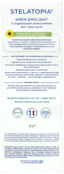 Białe opakowanie Stelatopia Krem Emolient dla niemowląt, z organicznym słonecznikiem, widok z przodu.
